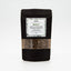Recharge de basilic Épices Moralès en sachet kraft noir refermable, herbe aromatique séchée pour la cuisine italienne.
