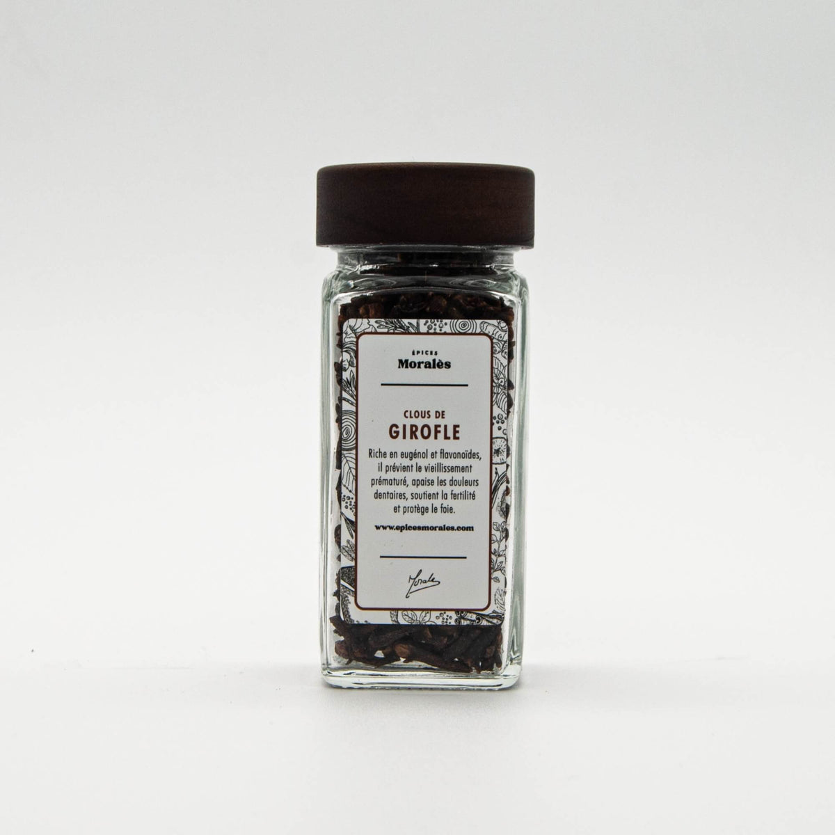 Fiole de clous de girofle Épices Moralès, boutons floraux séchés au goût puissant pour plats et infusions.