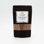 Recharge de coriandre en poudre Épices Moralès en sachet kraft noir refermable, épice douce et aromatique.