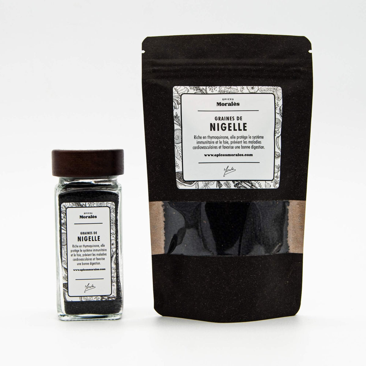 Fiole et recharge de graines de nigelle Épices Moralès, graines noires aromatiques idéales pour salades et pâtisseries.
