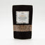 Recharge de graines de tournesol Épices Moralès en sachet kraft noir refermable, graines naturelles riches en fibres et goût.