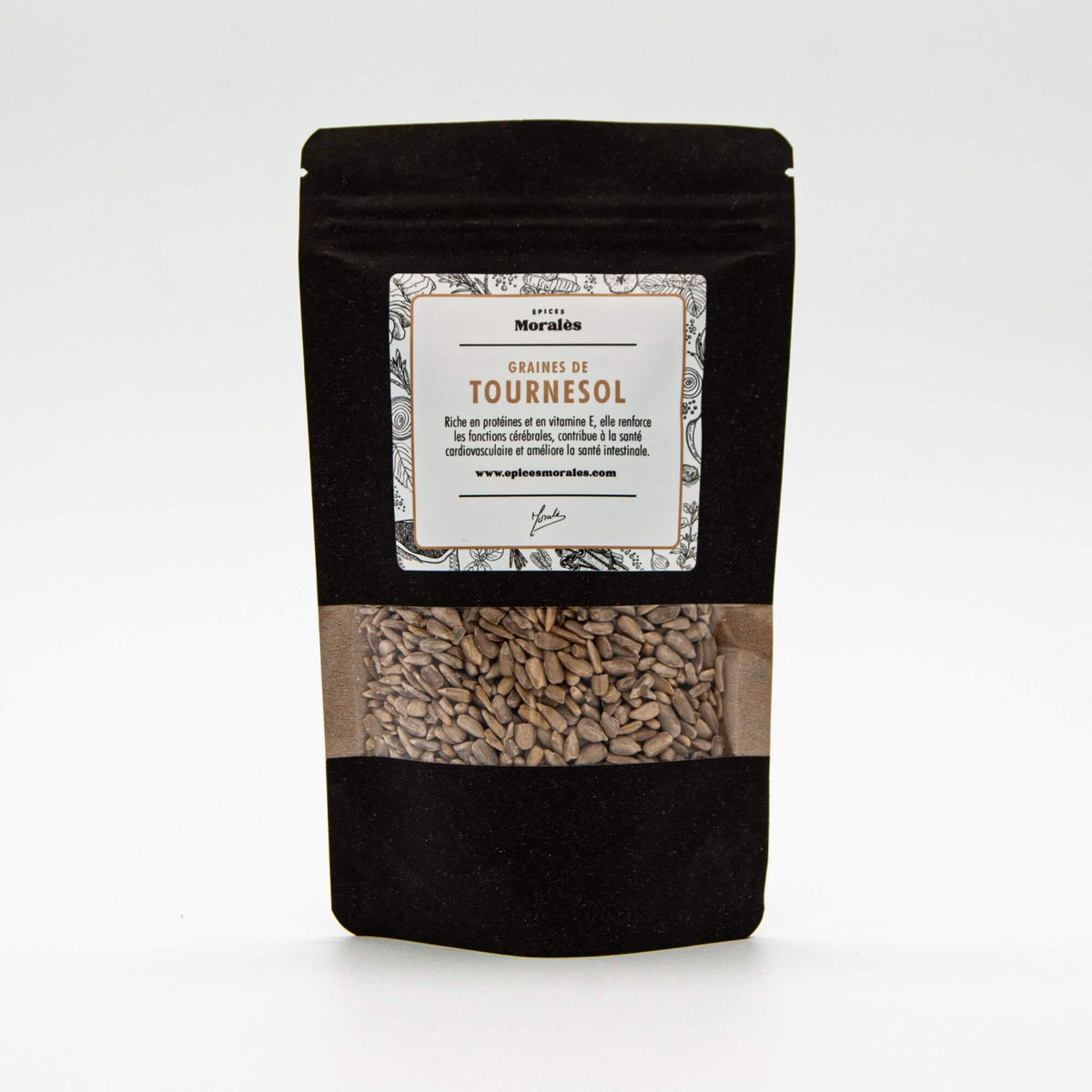 Recharge de graines de tournesol Épices Moralès en sachet kraft noir refermable, graines naturelles riches en fibres et goût.