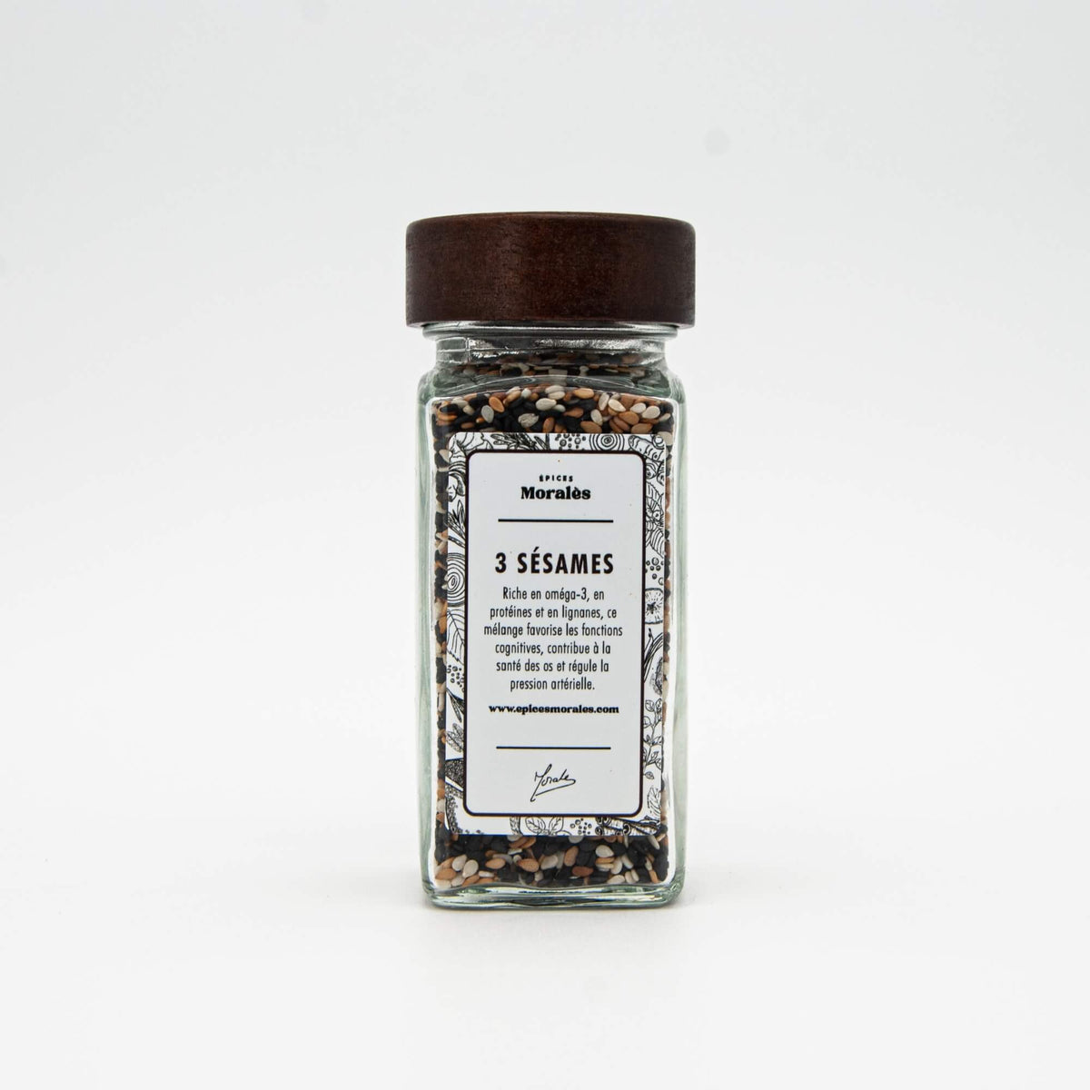 Fiole de graines trois sésames Épices Moralès, mélange doré, noir et blanc pour plats et salades.