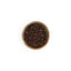 Bol de poivre noir en grains Épices Moralès vu du dessus, grains entiers pour moulin, bouillons et marinades.