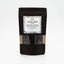 Recharge de poivre noir en grains Épices Moralès en sachet kraft noir refermable, poivre intense pour assaisonnement.