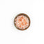 Bol de sel rose de l'Himalaya Épices Moralès vu du dessus, cristaux roses à moudre sur légumes et grillades.